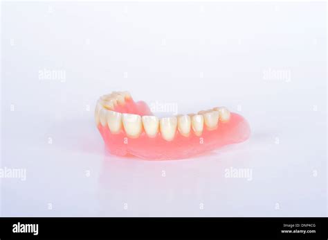 Photo of false teeth Stock Photo - Alamy