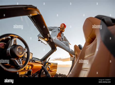 Girl On Car Roof High Resolution Stock Photography And Images Alamy