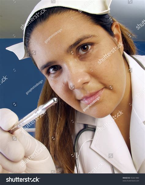 Nurse Holding Thermometer Stock Photo 55261483 | Shutterstock