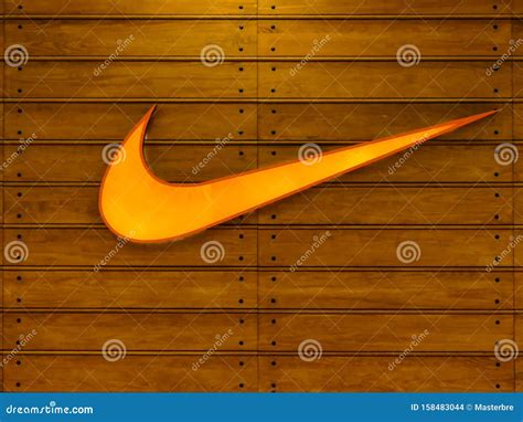 Nike Neon Logo on Nike Store. Editorial Stock Image - Image of editorial, swoosh: 158483044