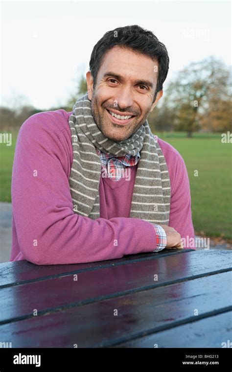 A Mid Adult Man Sitting At A Table In Dulwich Park Stock Photo Alamy