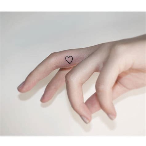 Tiny Heart Tattoo Done On The Finger