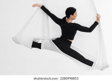 Female Black Tights Professional Aerial Performer Stock Photo