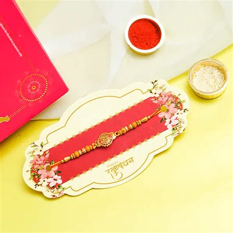 Buy Send Bead Rakhi With Kaju Katli Online Floraindia