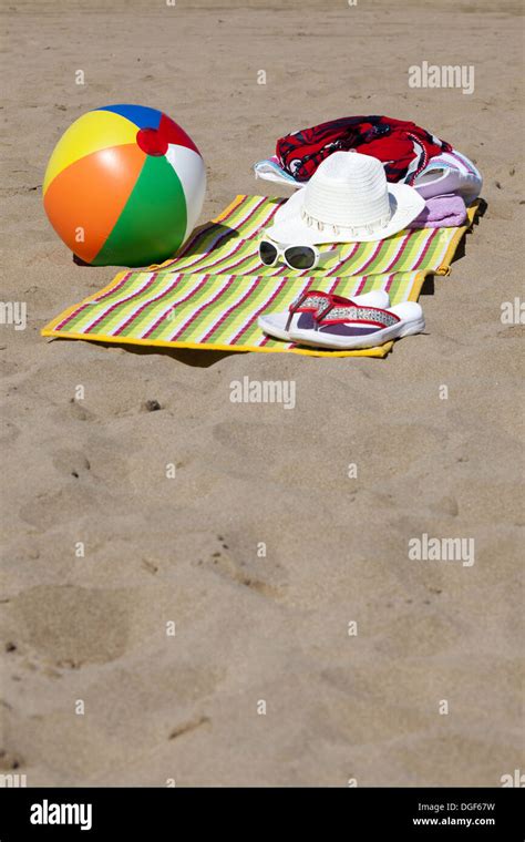 Beach Scene In The Summer With Flip Flops Beach Ball Towel