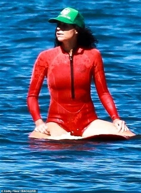 Minnie Driver 50 Flaunts Her Toned Figure In A Red Bikini Wetsuit While Surfing In Malibu