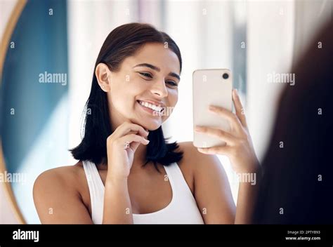 Mirror Selfie Happy Woman And Phone Beauty And Skincare In Bathroom