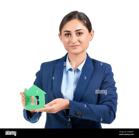 Female Real Estate Agent With Figure Of House On White Background Stock