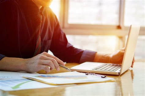 Close Up Of Hand Of Business Man Working Document And Nemotec