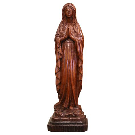 Statue de la Vierge Marie en bois doré sculpté et polychrome du milieu