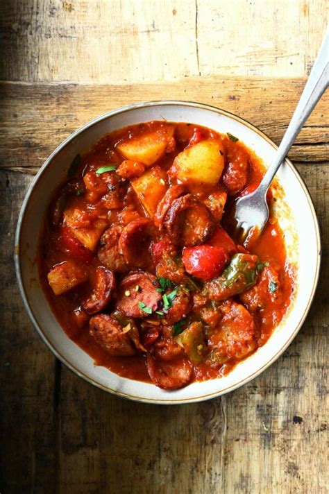 Potato And Sausage Stew Serving Dumplings