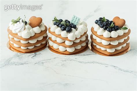 Layered Naked Cakes With Cream Cheese Filling Decorated With