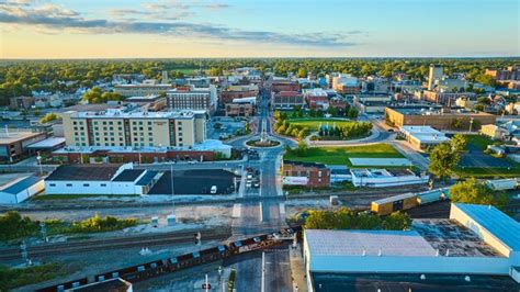 Premium Photo Train On Track With Downtown Building Aerial Of Muncie