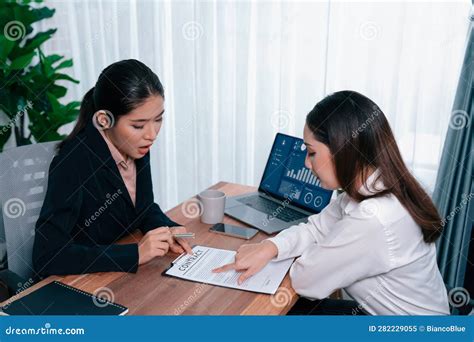 Business Deal Meeting Businesswomen Reviewing Terms And Condition