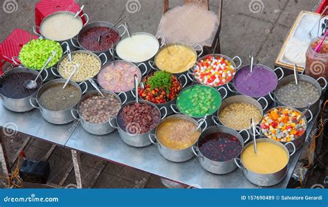 Group of Metal Pots on a Vietnamese Street Stall Containing Various ...