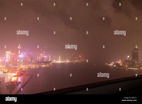 Hong Kong harbour by night Stock Photo - Alamy