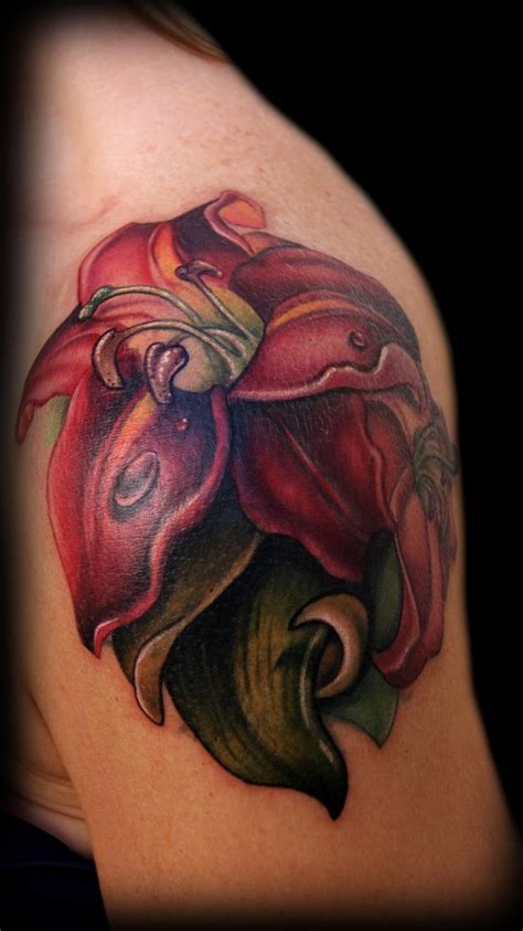 Red Lily coverup tattoo by Kelly Doty : Tattoos