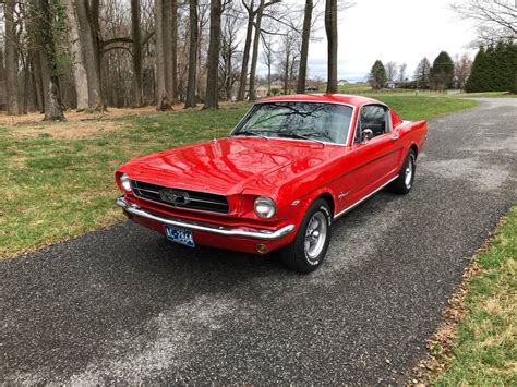 Red 65 Mustang 289/4-Speed Fastback For Sale | GuysWithRides.com