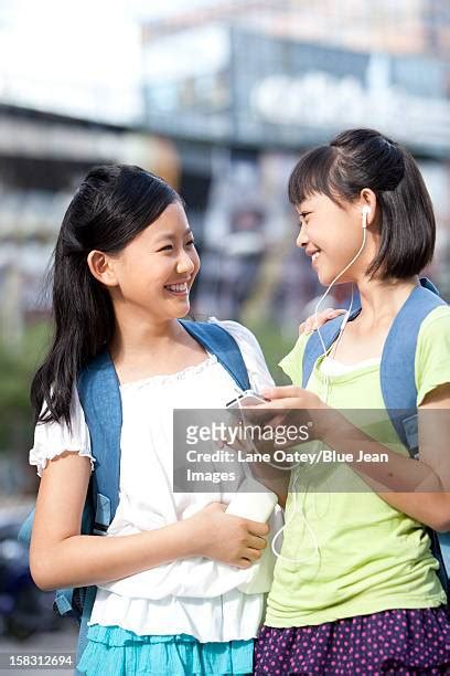 169 Two Preteen Girls Sharing Earphones Stock Photos High Res Pictures