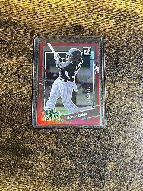 2023 Panini Donruss 66 Rated Prospect Holo Red Oscar Colas 999 White