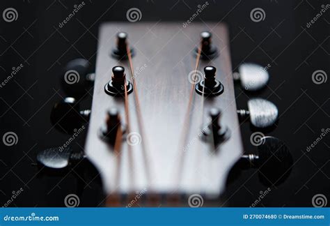 Guitar Head And Tuning Pegs In Closeup Professional Acoustic Guitar In