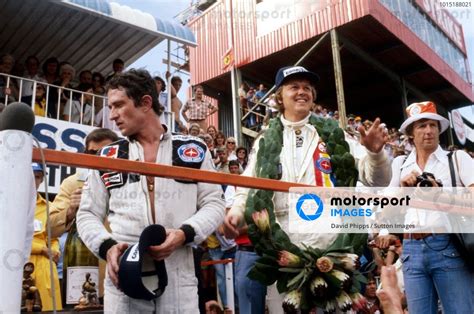 The Podium L To R Second Placed Patrick Depailler FRA Tyrrell