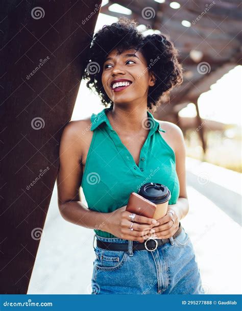 Cheerful Smiling Dark Skinned Hipster Girl Enjoying Leisure Time And