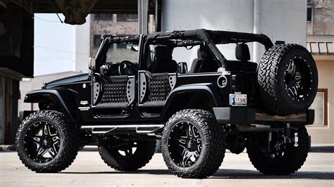 Blacked out custom Jeep Wrangler to view custom homes in north Idaho ...