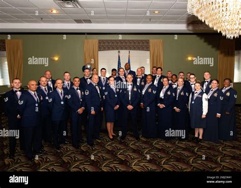 More Than 30 Airmen Promoted To Master Sergeant Pose For A Group Photo