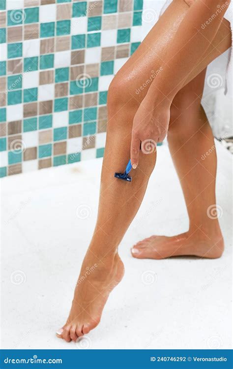 Skin Care And Health Hair Removal Fit Woman Shaving Her Legs With