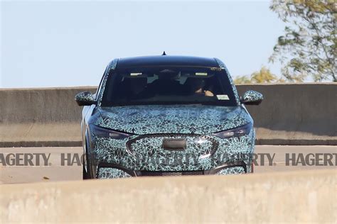 Behold Fords Mustang Inspired Electric Crossover Covered In Camo Hagerty Media