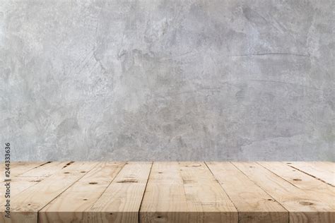 Empty Wooden Table And Concrete Wall Texture And Background With Copy