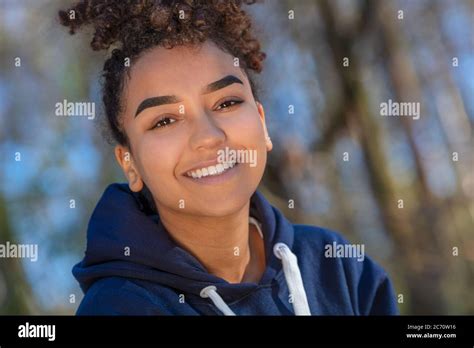 Outdoor Portrait Of Beautiful Happy Mixed Race Biracial African