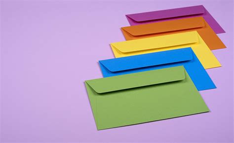 Tidy Coloured Envelopes On A Light Pink Background 1900989 Stock Photo