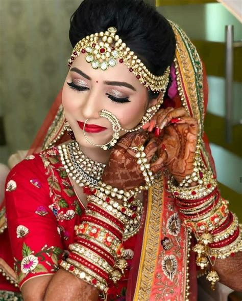 Indian Bride Poses Indian Bride Makeup Indian Wedding Poses Indian