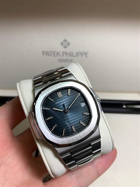 PATEK PHILIPPE NAUTILUS 5711 1A 010 IN STAINLESS STEEL BLUE DIAL Carr