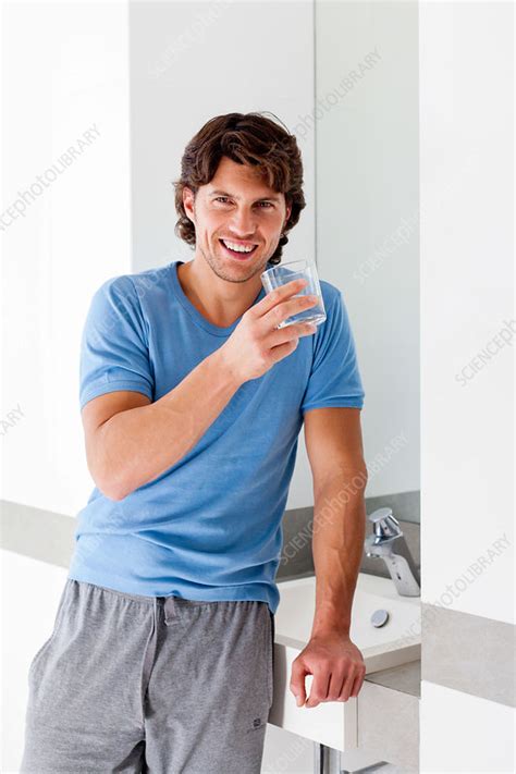 Man Drinking Glass Of Water Stock Image C Science Photo