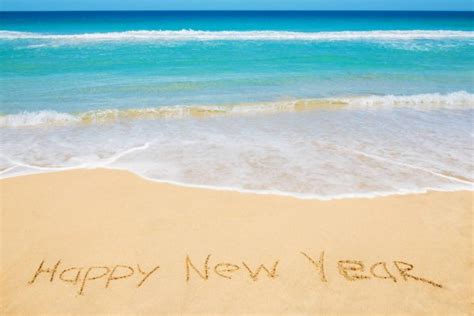 Happy new year on beach Stock Photo by ©yellow2j 128668530