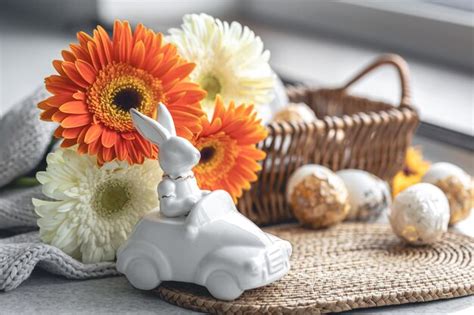 Free Photo Easter Composition With A Ceramic Hare Gerbera Flowers And