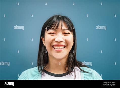 Portrait Of Young Asian Girl Smiling At Camera Happy Chinese Woman