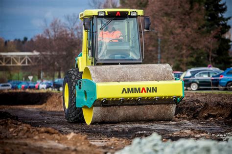 Аренда грунтового катка Ammann AC 120 14 тонн в СПб цена