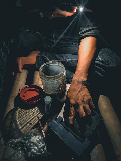 The Traditional Method of Rolling Cigarettes Stock Photo - Image of ...