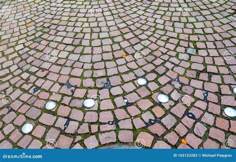 Detailed Close Up View On Cobblestone Streets And Sidewalks In High