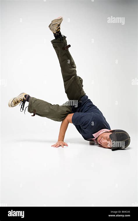 Young man breakdancing Stock Photo - Alamy