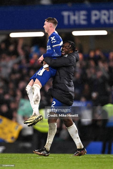 Cole Palmer Of Chelsea Celebrates Victory With Teammate Axel Disasi