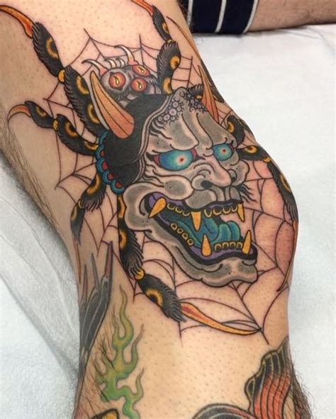 A Man With A Tattoo On His Leg