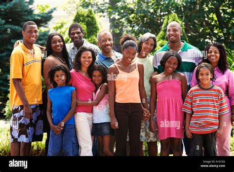 Extended African family smiling together Stock Photo - Alamy