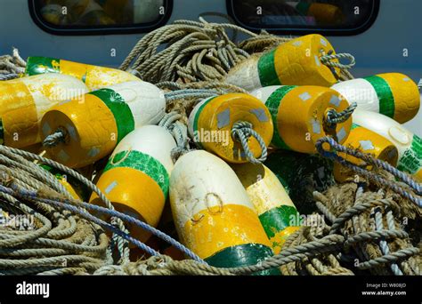 Crab Trap Floats And Buoys Pilled On A Commercial Fishing Vessel In A