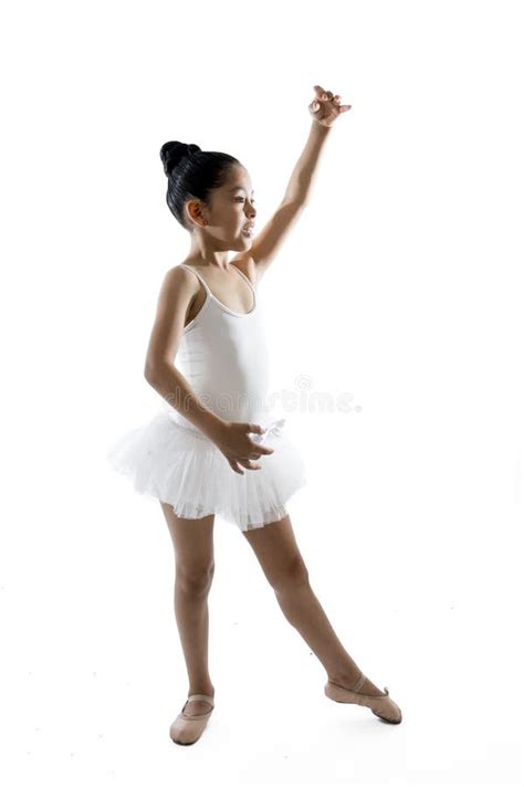 Sweet Young Little Cute Ballet Dancer Girl Dancing On White Background