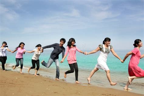 Happy people at beach stock photo. Image of female, vacation - 9479934